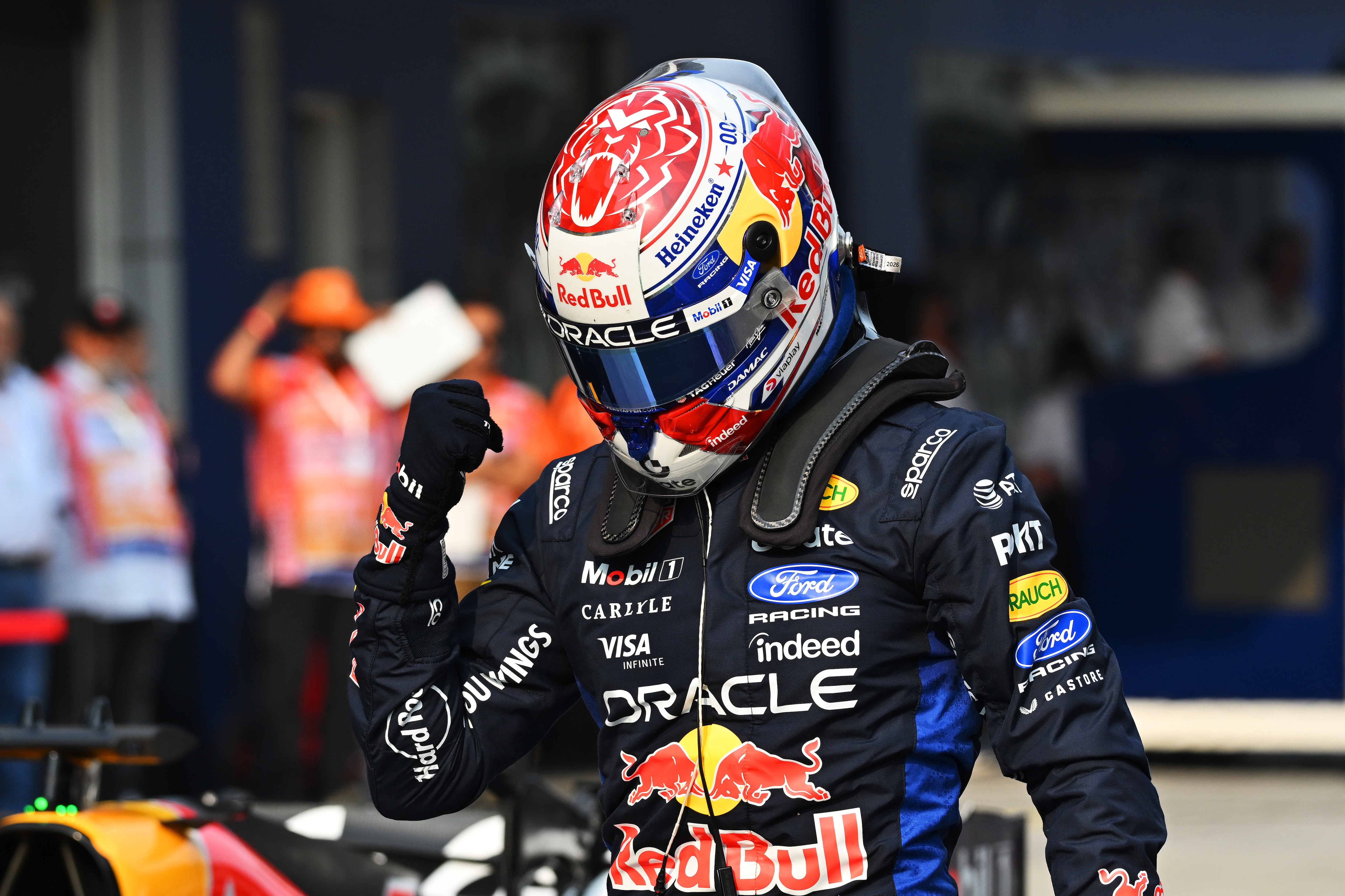 KUALA LUMPUR, MALAYSIA - OCTOBER 03: Pole position qualifier Max Verstappen of the Netherlands and Oracle Red Bull Racing celebrates on arrival in parc ferme during qualifying ahead of the F1 Grand Prix of Bahrain in Malaysia at Sepang Circuit on October 03, 2026 in Kuala Lumpur, Malaysia. (Photo by Michael Potts/LAT Images)